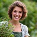 Portrait of Sarah Thyme, a gardening expert specializing in plant diseases